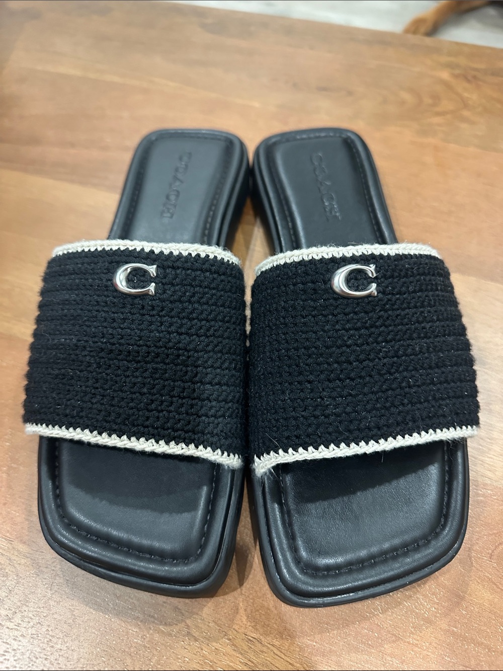 Like New Coach Black Crochet Slide Sandals with Cream Trim and Silver 'C'